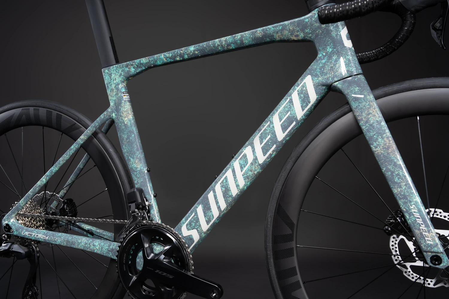 Cuadro de carbono Verde Agua marmolado con homologación UCI